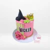 Wicked Cake – A striking cake with green and black edible prints, ideal for Birmingham celebrations.