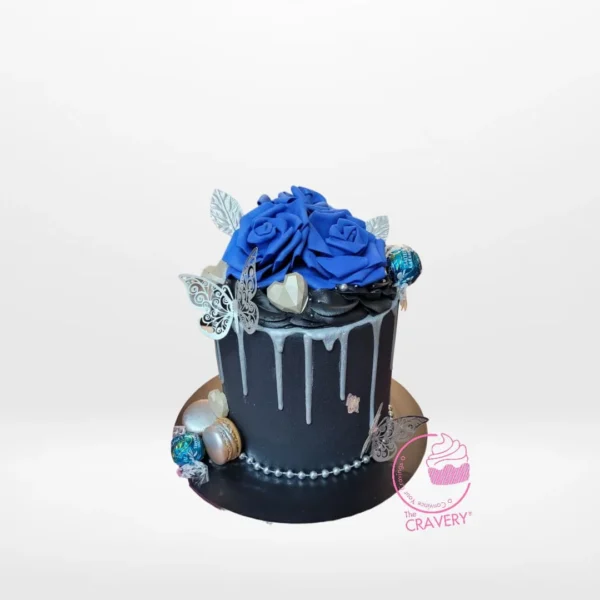 Cake and Roses – A romantic cake adorned with roses, butterflies, and bead strings, perfect for celebrations in Birmingham.