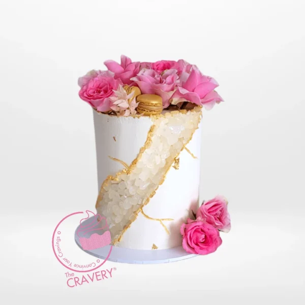 Cake with Garden Theme by The Cravery, elegant floral cake handcrafted at our cake shop on Witton Road.