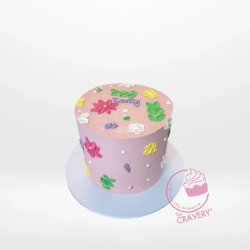 Flower Birthday Cake from cake makers Birmingham – A delightful dessert adorned with edible flowers.