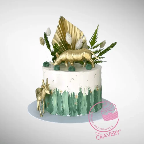 Jungle Themed Cake with animal decorations handcrafted at The Cravery, cake shop Sheldon.