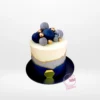 Modern Cake – A stylish cake with non-edible decorative balls and birthday sign, perfect for celebrations in Birmingham.