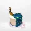 Peacocks Cake – A custom cake featuring peacock feathers, available at our cake shop Birmingham.