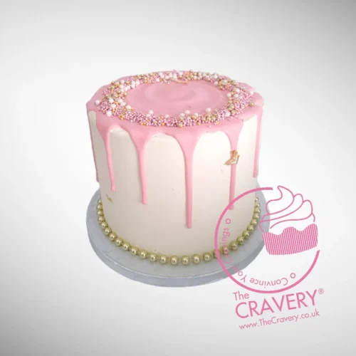 Pink and Gold Drip Cake with elegant design from Cravery Cakes Delivered Birmingham