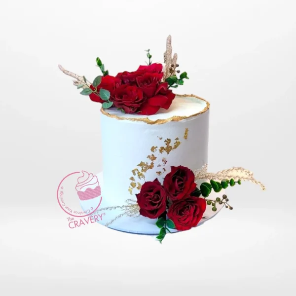 Roses Cake from cake shop solihull – A beautiful cake adorned with intricate non-edible roses.
