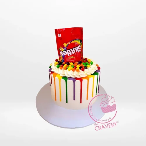 Skittles Cake – A colorful and vibrant cake adorned with Skittles candies, perfect for celebrations in Solihull.