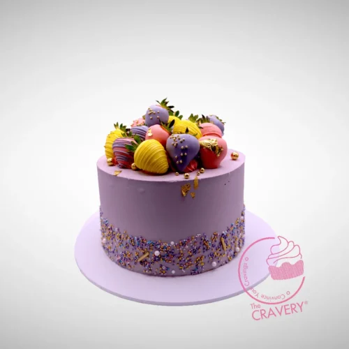 Fresh Strawberry Cake from The Cravery Cake Shop in Birmingham, topped with ripe strawberries and smooth buttercream.