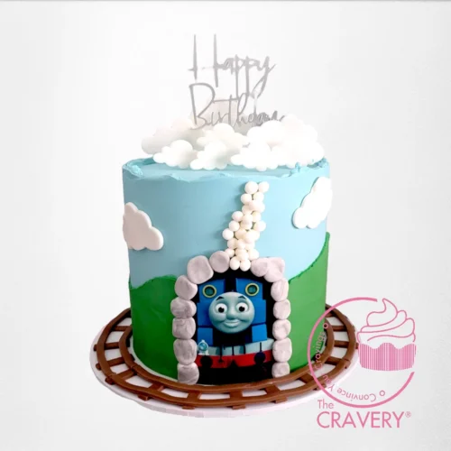 Thomas the Train Cake from Cravery's Cake Shop Birmingham. A fun, themed birthday cake perfect for Thomas the Tank Engine fans.
