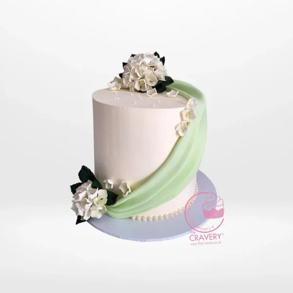 White Birthday Cake from Cravery Cake Makers Solihull – A refined and delicious centerpiece for your celebration.