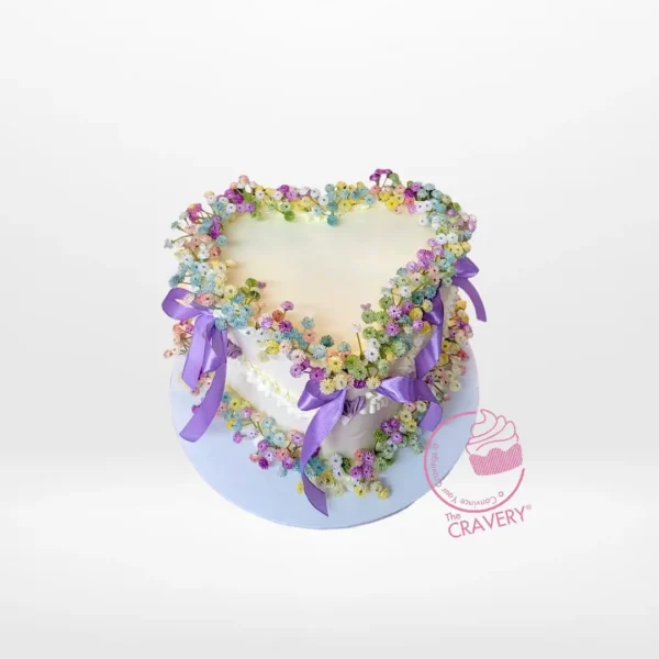 Cake Shaped Heart – A heart-shaped cake with buttercream frosting and fondant decorations, perfect for romantic celebrations in Birmingham.