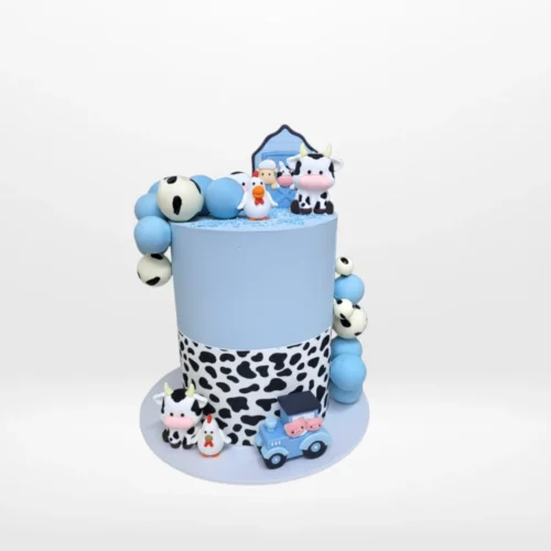 Farmyard Birthday Cake – A delightful cake with toy animals, perfect for Birmingham kids’ parties.