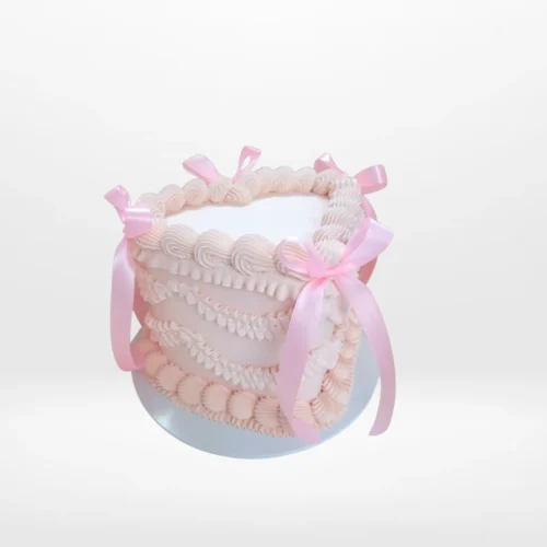 Heart Pink Cake – A romantic pink cake adorned with sugar pearls and fondant hearts, perfect for celebrations in Birmingham.