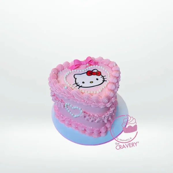 Hello Kitty Heart Cake – A heart-shaped cake adorned with Hello Kitty decorations, perfect for celebrations in Birmingham.