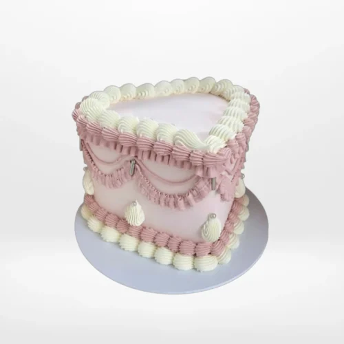 Mothers Day Cake Ideas – A beautiful Mother's Day cake adorned with edible blossoms and non-edible roses, perfect for celebrations in Solihull.