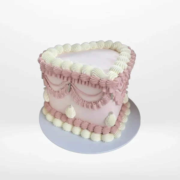 Mothers Day Cake Ideas – A beautiful Mother's Day cake adorned with edible blossoms and non-edible roses, perfect for celebrations in Solihull.