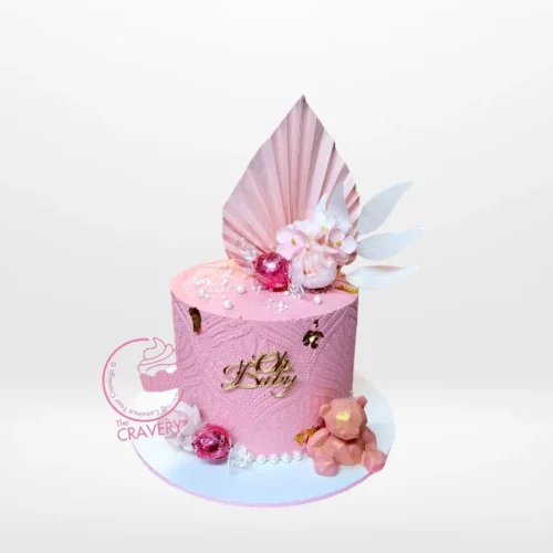 Pink and Cake – A beautifully designed cake adorned with pink hues and floral decorations, perfect for celebrations in Birmingham.