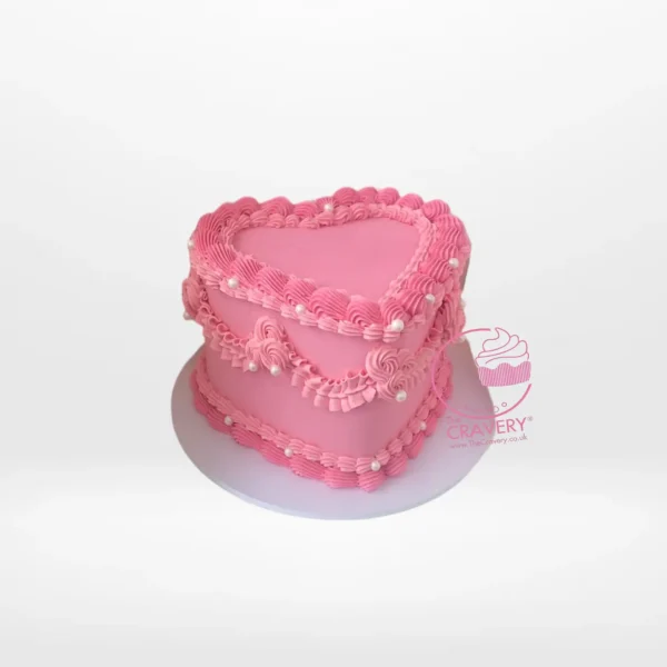 Shaped Heart Cake – A romantic heart-shaped cake with buttercream frosting and fondant decorations, perfect for celebrations in Birmingham.