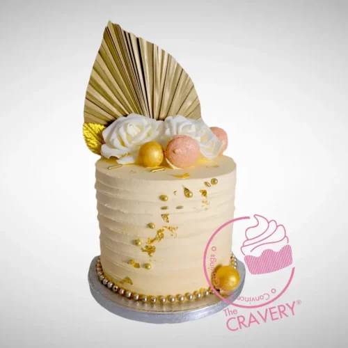 Female 50th Birthday Cake from Cravery’s cake shop Moseley with elegant floral and fan design.