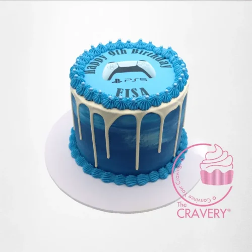 Play Station Cake from The Cravery cake shop in Selly Oak, featuring a PlayStation console design with a customisable name and age.