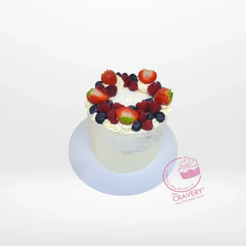 Fruit Cake by The Cravery, semi-naked cake with strawberries, raspberries, and blueberries from our cake shop in Walsall.