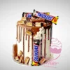 Snickers Cake by The Cravery, handcrafted chocolate-inspired design topped with Snickers bars, among the best birthday cakes in Birmingham.