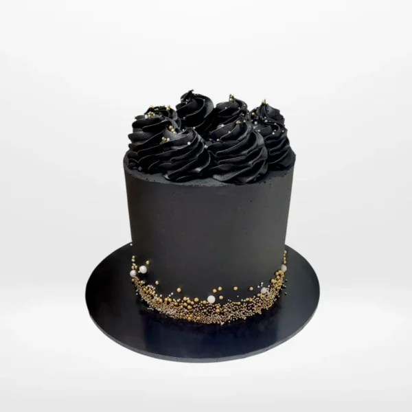 A Chocolate cake with smooth buttercream finish and rich decorative details handcrafted in Birmingham.