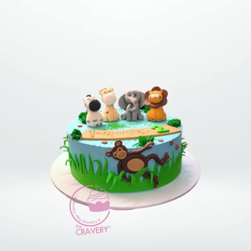 Birthday Cake Safari – A jungle-themed cake with animal and fondant decorations, available at our cake shop birmingham city centre.