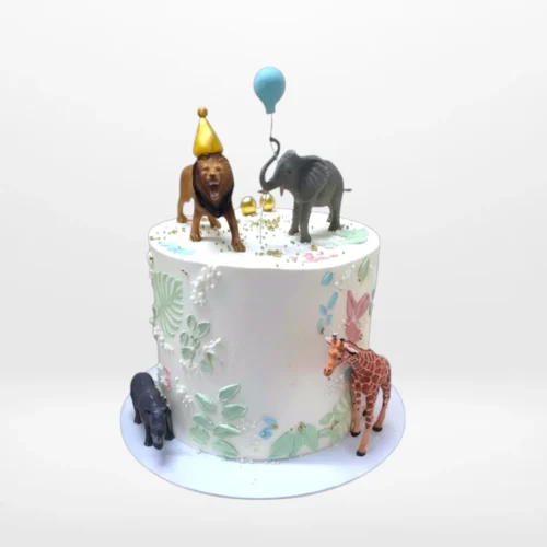Birthday Cake Safari – A jungle-themed cake with animal and fondant decorations, available at our cake shop birmingham city centre.