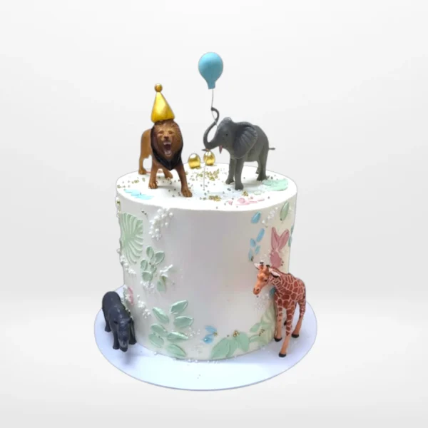 Birthday Cake Safari – A jungle-themed cake with animal and fondant decorations, available at our cake shop birmingham city centre.