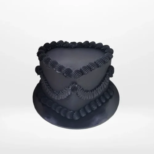 Black Cake Shape Heart – A romantic cake designed in the shape of a heart, perfect for special occasions in Birmingham.
