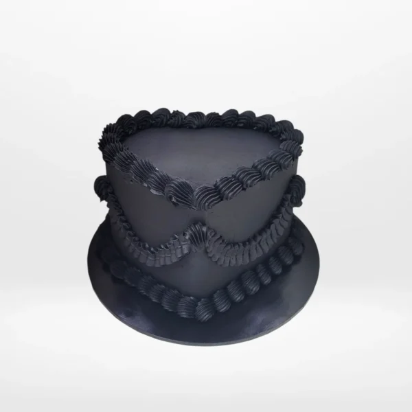 Black Cake Shape Heart – A romantic cake designed in the shape of a heart, perfect for special occasions in Birmingham.