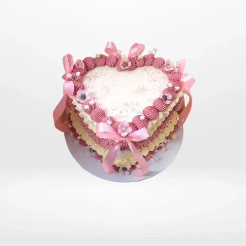 Cake with Heart Shape – A romantic cake in the shape of a heart, perfect for celebrations in Birmingham.