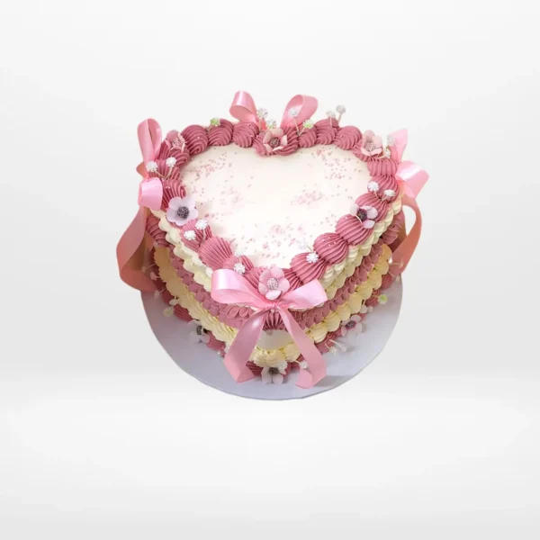 Cake with Heart Shape – A romantic cake in the shape of a heart, perfect for celebrations in Birmingham.