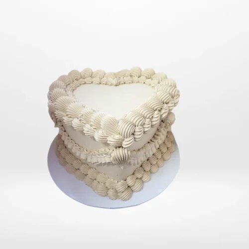 Choco Heart Cake – A decadent chocolate cake with ganache and chocolate shavings, perfect for celebrations in Birmingham.