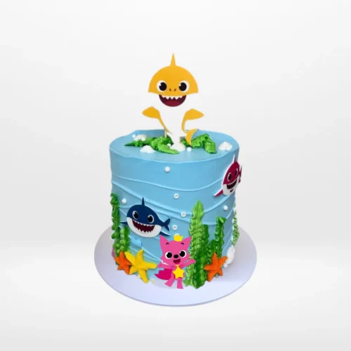 Babyshark Cake with Waves, themed blue cake with sea-inspired decorations and Baby Shark characters, from the best cake shop in Birmingham