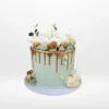 Gold Drip Cake with floral accents, cake shop Mere Green