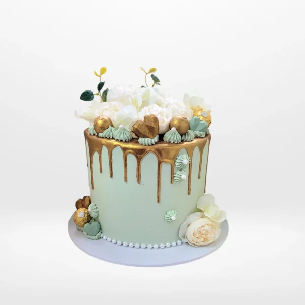 Gold Drip Cake with floral accents, cake shop Mere Green