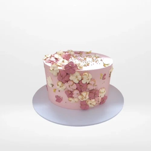 Pink cake cake with smooth buttercream finish and elegant decorative details handcrafted in Birmingham.