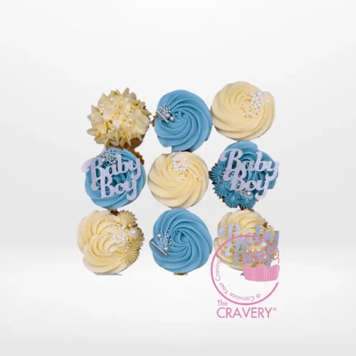 Babyshower Cupcakes for Boy by The Cravery, blue and white cupcakes with buttercream frosting and baby-themed decorations, baked fresh in Birmingham.