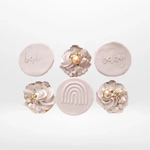 Baby shower cupcakes with soft colours and decorative buttercream made in Birmingham.