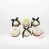 Bow Cupcakes by The Cravery, handcrafted elegant cupcakes with bow decorations, freshly baked in Solihull.