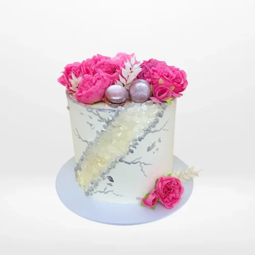 Cake with Garden Theme by The Cravery, elegant floral cake handcrafted at our cake shop on Witton Road.