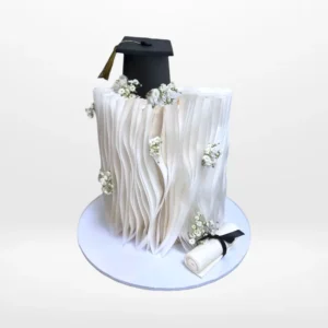 Modern Graduation Cake by The Cravery, handcrafted elegant cake from our cake shop in Mere Green.