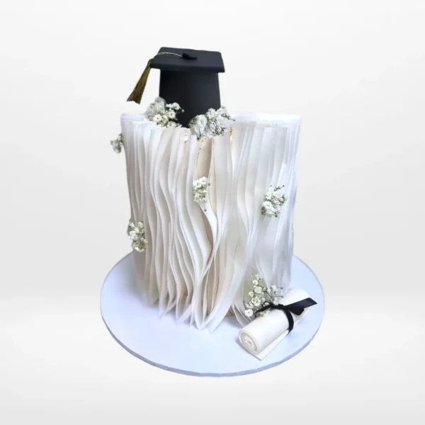 Modern Graduation Cake by The Cravery, handcrafted elegant cake from our cake shop in Mere Green.