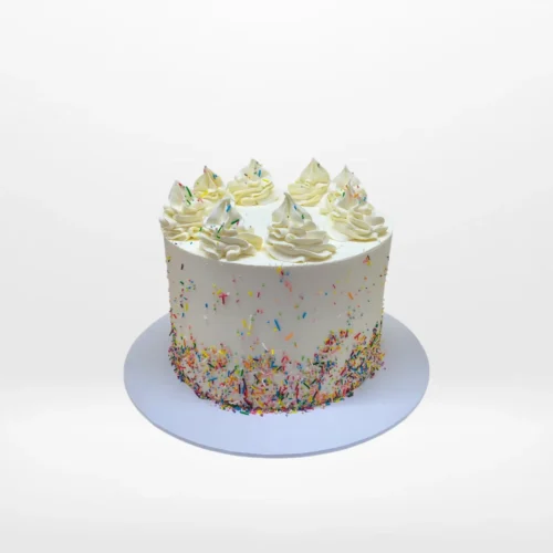 Pastel Rainbow Cake by The Cravery, colourful handcrafted cake made fresh at our cake shop in Shirley.