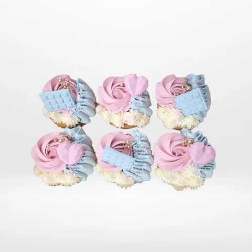 Pink and Blue Cupcakes by The Cravery, handcrafted pastel cupcakes topped with buttercream frosting, baked fresh in Birmingham.