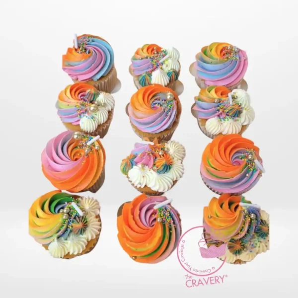 Cupcakes with Rainbows by The Cravery, cupcakes topped with colourful rainbow swirl buttercream, freshly baked in Birmingham.