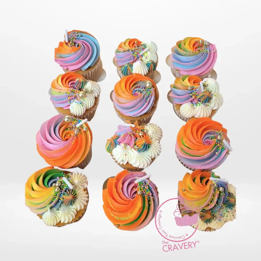 Cupcakes with Rainbows by The Cravery, cupcakes topped with colourful rainbow swirl buttercream, freshly baked in Birmingham.
