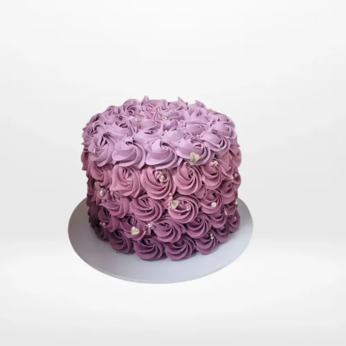 Elegant Rose Cake by The Cravery, handcrafted floral buttercream cake from our cake shop on Witton Road.