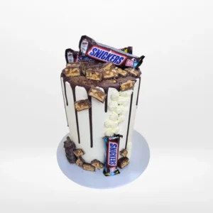 Snickers Cake by The Cravery, handcrafted chocolate-inspired design topped with Snickers bars, among the best birthday cakes in Birmingham.